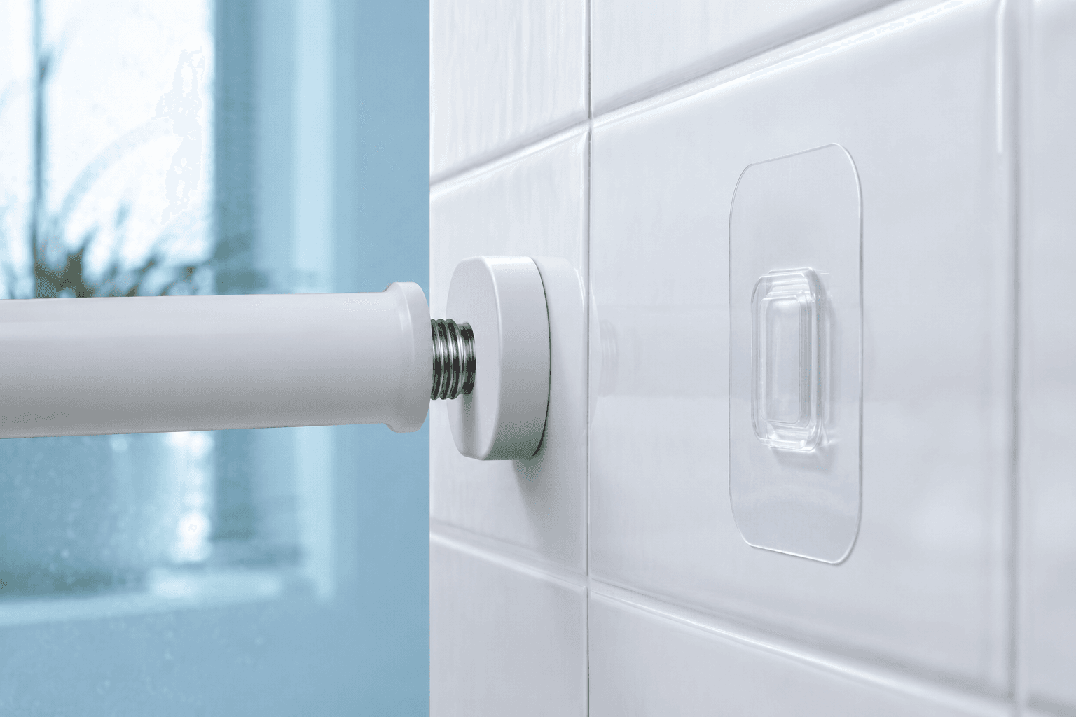 Close-up of tension and adhesive fittings on suitable bathroom surfaces